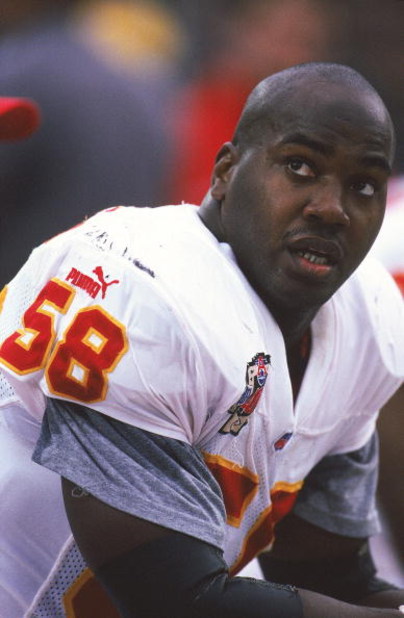 28 Nov 1999: A close up of Derrick Thomas #58 of the Kansas City Chiefs as he looks on from the sidelines during the game against the Oakland Raiders at the Network Associates Coliseum in Oakland, California. The Chiefs defeated the Raiders 37-34.