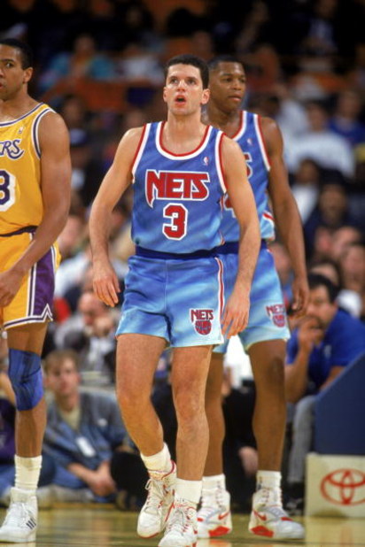 INGLEWOOD, CA - 1990-91:  Drazen Petrovic #3 of the New Jersey Nets stands on the court during a 1990-91 season game against the Los Angeles Lakers at the Great Western Forum in Inglewood, California. NOTE TO USER: User expressly acknowledges and agress t