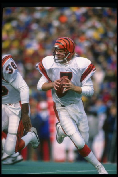 26 Nov 1989: Quarterback Boomer Esiason of the Cincinnati Bengals looks to pass the ball during a game against the Buffalo Bills at Rich Stadium in Orchard Park, New York. The Bills won the game, 24-7.