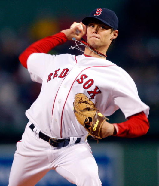 BOSTON - APRIL 11:  Clay Buchholz #61 of the Boston Red Sox throws against the New York Yankees at Fenway Park April 11, 2008 in Boston, Massachusetts.  (Photo by Jim Rogash/Getty Images)