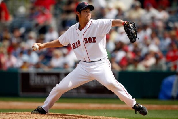 FORT MYERS, FL - MARCH 08: Pitcher Junichi Tazawa #86 of the Boston Red Sox pitches against the Tampa Bay Rays during a Grapefruit League Spring Training Game at City of Palms Park on March 8, 2009 in Fort Myers, Florida. (Photo by J. Meric/Getty Images