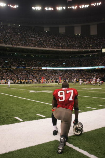 NEW ORLEANS -OCTOBER 8:  Defensive end Simeon Rice #97 of the Tampa Bay Buccaneers watches the game against the New Orleans Saints at the Louisiana Superdome on October 8, 2006 in New Orleans, Louisiana. The Saints won 24-21.  (Photo by Ronald Martinez/Ge