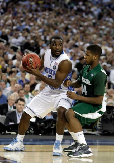 DETROIT - APRIL 06:  Ty Lawson #5 of the North Carolina Tar Heels  looks to drive on Korie Lucious #34 of the Michigan State Spartans during the 2009 NCAA Division I Men's Basketball National Championship game at Ford Field on April 6, 2009 in Detroit, Mi