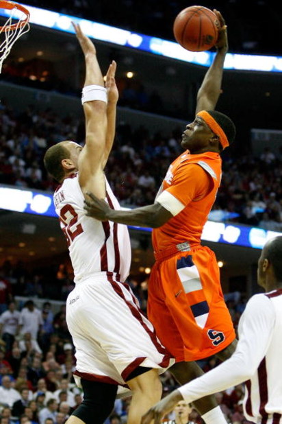 MEMPHIS, TN - MARCH 27:  Jonny Flynn #10 of the Syracuse Orange goes up for a dunk over Taylor Griffin #32 of the Oklahoma Sooners in the second half during the NCAA Men's Basketball Tournament South Regionals at the FedExForum on March 27, 2009 in Memphi