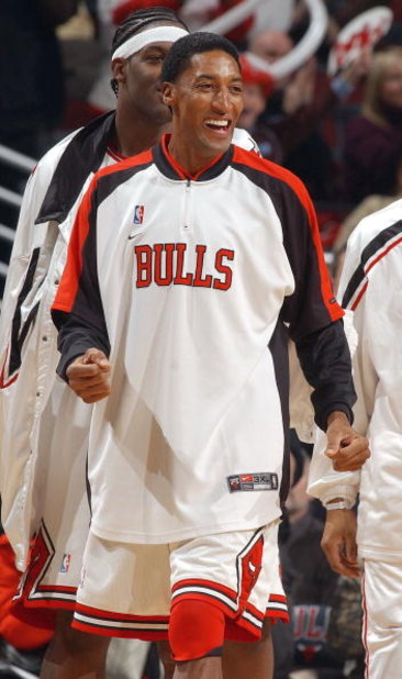 CHICAGO - DECEMBER 1:  Scottie Pippen #33 of the Chicago Bulls cheers his teammates during fourth-quarter NBA action against the Milwaukee Bucks at the United Center December 1, 2003 in Chicago, Illinois. The Bulls defeated the Bucks 97-87.  NOTE TO USER: