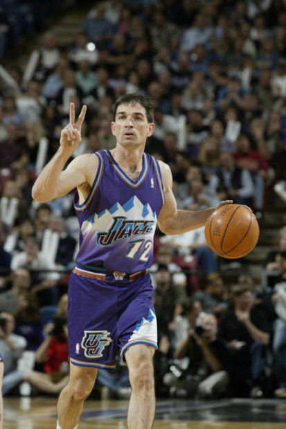 SACRAMENTO, CA - APRIL 30:  John Stockton #12 of the Utah Jazz dribbles in Game five of the Western Conference Quarterfinals against the Sacramento Kings during the 2003 NBA Playoffs at Arco Arena on April 30, 2003 in Sacramento, California.  The Kings wo