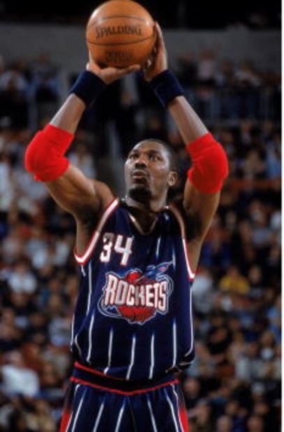 9 Dec 2000: Hakeem Olajuwon #34 of the Houston Rockets gets ready to shoot a free throw during the game against the Seattle SuperSonics at Key Arena in Seattle, Washington. The Rockets defeated the SuperSonics 111-104. NOTE TO USER: It is expressly un