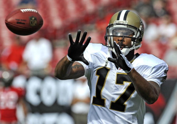TAMPA, FL - NOVEMBER 30:  Wide receiver Robert Meachem #17 of the New Orleans Saints grabs a warm up pass before play against the Tampa Bay Buccaneers at Raymond James Stadium on November 30, 2008 in Tampa, Florida.  (Photo by Al Messerschmidt/Getty Image