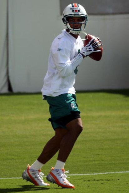 DAVIE, FL - MAY 02:  Rookie quarterback Pat White  #6 of the Miami Dolphins drops back to pass during mini camp on May 2, 2009 at the Miami Dolphins Training facility in Davie, Florida.  (Photo by Marc Serota/Getty Images)