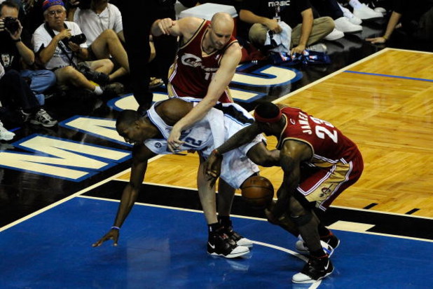 ORLANDO, FL - MAY 24:  LeBron James #23 of the Cleveland Cavaliers steals the ball from Dwight Howard #12 of the Orlando Magic in Game Three of the Eastern Conference Finals during the 2009 NBA Playoffs at the the Amway Arena on May 24, 2009 in Orlando, F