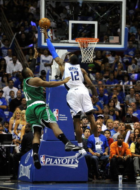 ORLANDO, FL - MAY 14:   Dwight Howard #12 of the Orlando Magic blocks the shot of Glen Davis #11 of the Boston Celtics in Game Six of the Eastern Conference Semifinals during the 2009 NBA Playoffs at Amway Arena on May 14, 2009 in Orlando, Florida.  NOTE 