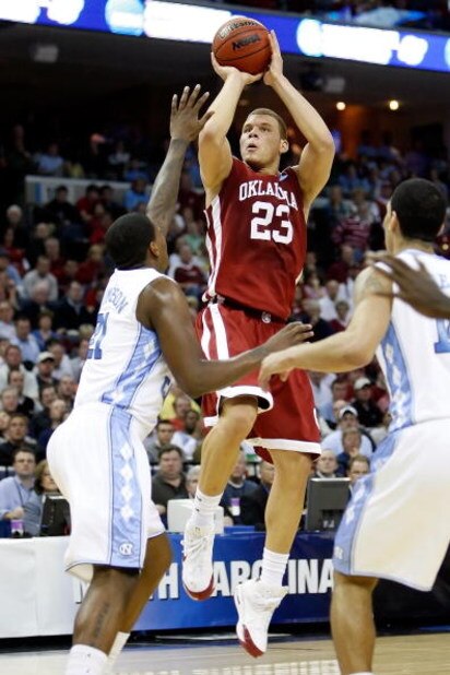 MEMPHIS, TN - MARCH 29: Blake Griffin #23 of the Oklahoma Sooners shoots the ball over Deon Thompson #21 of the North Carolina Tar Heels in the first half during the NCAA Men's Basketball Tournament South Regional Final at the FedExForum on March 29, 200