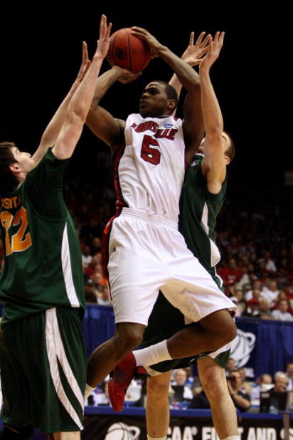 DAYTON, OH - MARCH 22: Earl Clark #5 of the Louisville Cardinals drives to the hoop against the Siena Saints during the second round of the NCAA Division I Men's Basketball Tournament at the University of Dayton Arena on March 22, 2009 in Dayton, Ohio.  (
