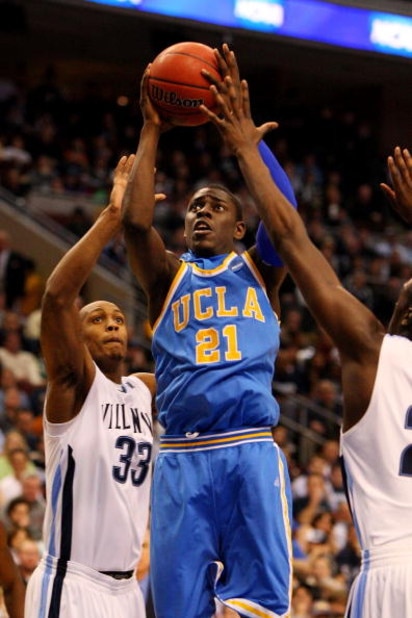 PHILADELPHIA - MARCH 21: Jrue Holiday #21 of the UCLA Bruins shoots against Dante Cunningham #33 of the Villanova Wildcats during the second round of the NCAA Division I Men's Basketball Tournament at the Wachovia Center on March 21, 2009 in Philadelphia