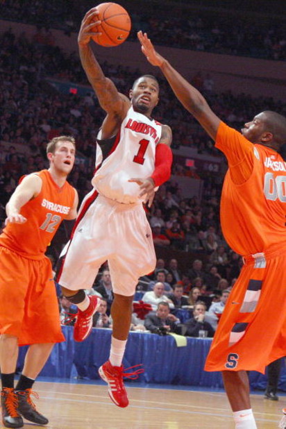 NEW YORK - MARCH 14:  Terrence Williams #1 of the Louisville Cardinals puts a shot up against the Syracuse Orange during the championship game of the Big East Tournament at Madison Square Garden on March 14, 2009 in New York City.  (Photo by Jim McIsaac/G