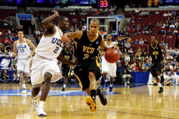 PHILADELPHIA - MARCH 19: Eric Maynor #3 of the VCU Rams drives against Darren Collison #2 of the UCLA Bruins during the first round of the NCAA Division I Men's Basketball Tournament at the Wachovia Center on March 19, 2009 in Philadelphia, Pennsylvania.