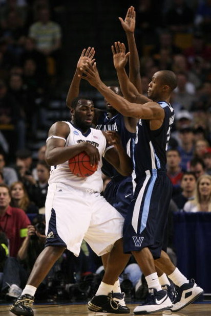 BOSTON - MARCH 28:  DeJuan Blair #45 of the Pittsburgh Panthers tries to get past Shane Clark #20 and Dante Cunningham #33 of the Villanova Wildcats during the NCAA Men's Basketball Tournament East Regionals at TD Banknorth Garden on March 28, 2009 in Bos