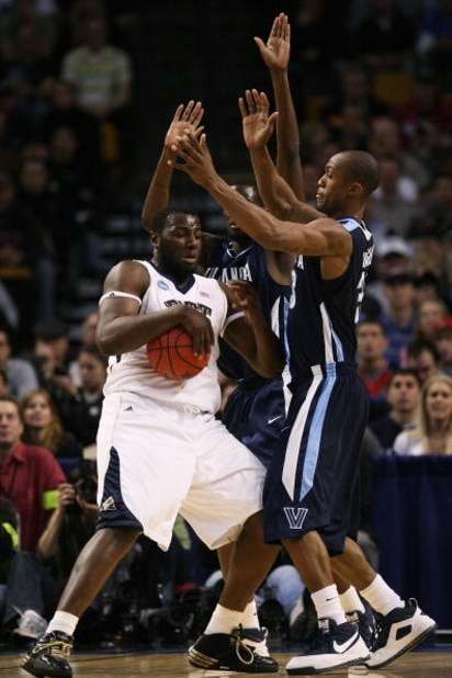 BOSTON - MARCH 28: DeJuan Blair #45 of the Pittsburgh Panthers tries to get past Shane Clark #20 and Dante Cunningham #33 of the Villanova Wildcats during the NCAA Men's Basketball Tournament East Regionals at TD Banknorth Garden on March 28, 2009 in Bos
