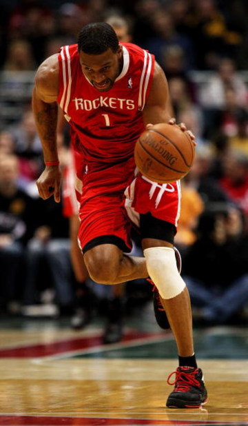 MILWAUKEE - FEBRUARY 09: Tracy McGrady #1 of the Houston Rockets moves upcourt after recovering a loose ball against the Milwaukee Bucks on February 9, 2009 at the Bradley Center in Milwaukee, Wisconsin. NOTE TO USER: User expressly acknowledges and agree