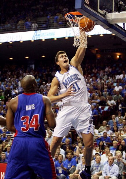 ORLANDO, FL - APRIL 28: Darko Milicic #31 of the Orlando Magic dunks in the first half over Dale Davis #34 of the Detroit Pistons in Game Four of the Eastern Conference Quarterfinals during the 2007 NBA Playoffs on April 28, 2007 at Amway Arena in Orland