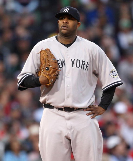 BOSTON - JUNE 11: CC Sabathia #52 of  New York Yankees reacts against the Boston Red Sox at Fenway Park on June 11, 2009 in Boston, Massachusetts.  (Photo by Jim Rogash/Getty Images)
