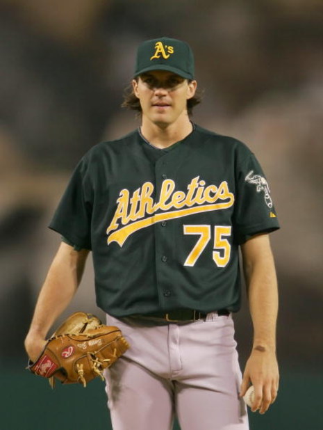 ANAHEIM, CA - AUGUST 30:  Barry Zito #75 of the Oakland Athletics looks on during the game against the Los Angeles Angels of Anaheim on August 30, 2005 at Angel Stadium in Anaheim, California.  The Athletics won 2-1.  (Photo by Lisa Blumenfeld/Getty Image