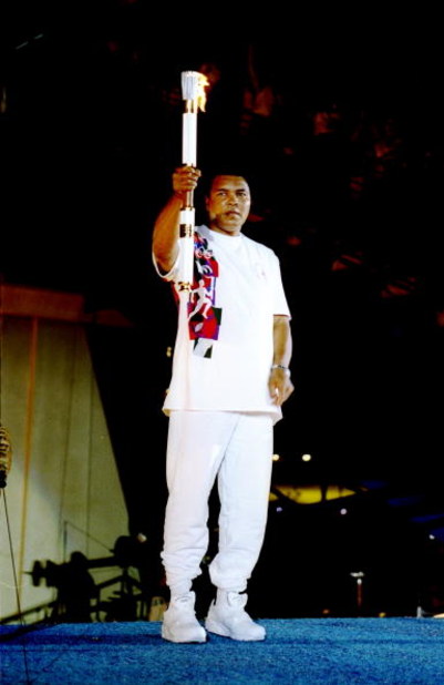 19 Jul 1996:  Muhammad Ali holds the torch before lighting the Olympic Flame during the Opening Ceremony of the 1996 Centennial Olympic Games in Atlanta, Georgia. \ Mandatory Credit: Michael Cooper  /Allsport