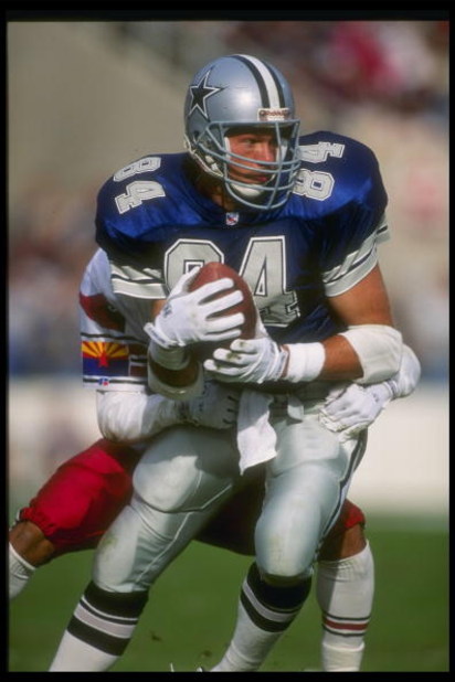 Tight end Jay Novacek of the Phoenix Cardinals runs with the ball