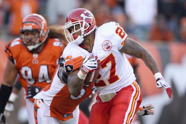 CINCINNATI - DECEMBER 28: Larry Johnson #27 of the Kansas City Chiefscarries the ball as he breaks a tackle during the NFL game against the Cincinnati Bengals on December 28, 2008 at Paul Brown Stadium in Cincinnati, Ohio. (Photo by Andy Lyons/Getty Imag