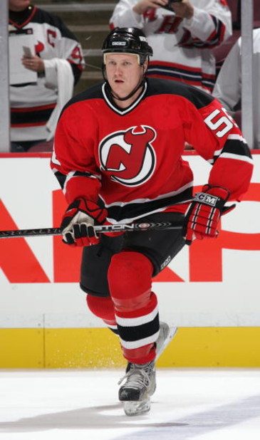 EAST RUTHERFORD, NJ - SEPTEMBER 25:  Ilkka Pikkarainen #58 of the New Jersey Devils skates during warm up prior to a preseason game against the New York Islanders at the Continental Airlines Arena on September 25, 2005 in East Rutherford, New Jersey. The 