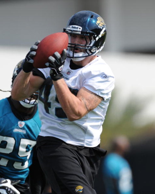 JACKSONVILLE, FL - MAY 1:  Tight end Zach Miller #49 of the Jacksonville Jaguars grabs a pass during a team mini-camp on May 1, 2009 on the practice fields at Jacksonville Municipal Stadium in Jacksonville, Florida.  (Photo by Al Messerschmidt/Getty Image
