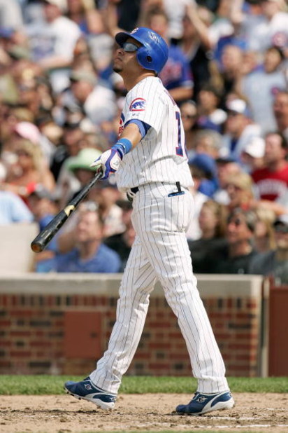 Chicago Cubs Kenny Lofton and Aramis Ramierez celebrate their win