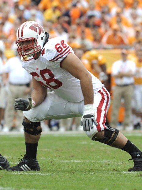 TAMPA, FL - JANUARY 1: Lineman Gabe Carimi #68 of the Wisconsin Badgers sets to block against the Tennessee Volunteers in the 2008 Outback Bowl at Raymond James Stadium on January 1, 2008 in Tampa, Florida. The Volunteers won 21 - 17. (Photo by Al Mess