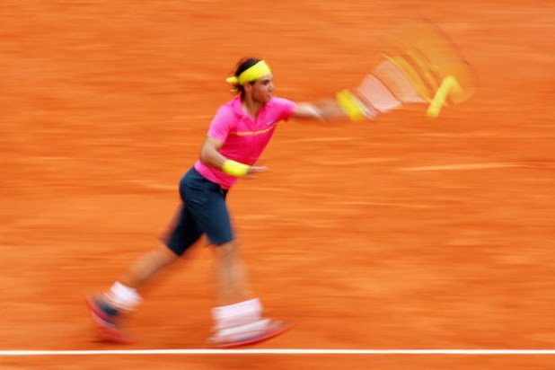 PARIS - MAY 31: Rafael Nadal of Spain hits a forehand during the Men's Singles Fourth Round match against Robin Soderling of Sweden on day eight of the French Open at Roland Garros on May 31, 2009 in Paris, France. (Photo by Ryan Pierse/Getty Images)