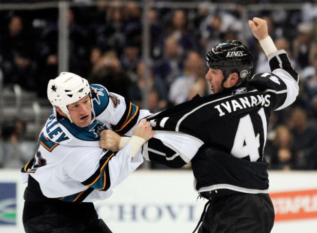 LOS ANGELES, CA - APRIL 11:  Raitis Ivanans #41 of the Los Angeles Kings and Jody Shelley #45 of the San Jose Sharks fight during the second period of the hockey game on April 11, 2009 at the Staples Center in Los Angeles, California.  (Photo by Kevork Dj