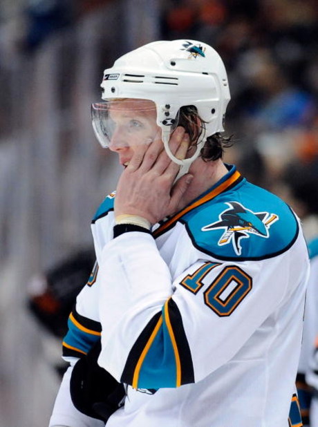 ANAHEIM, CA - APRIL 23:   Christian Ehrhoff #10 of the San Jose Sharks wipes his face during a break in game action against the Anaheim Ducks in the third period during Game Four of the Western Conference Quarterfinal Round of the 2009 Stanley Cup Playoff