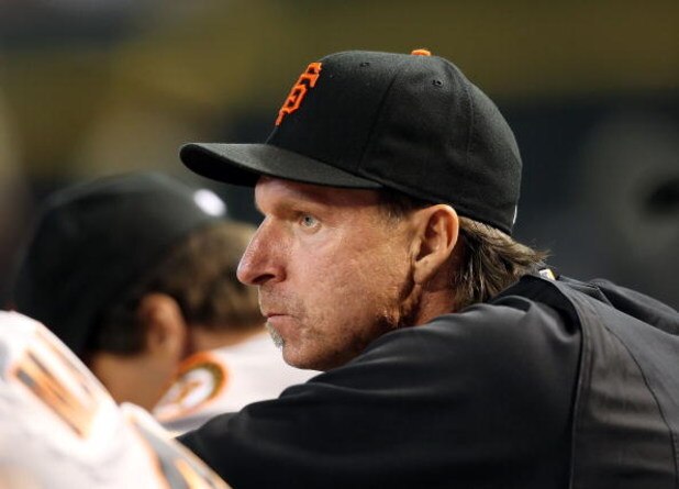 PHOENIX - JUNE 11: Pitcher Randy Johnson #51 of the San Francisco Giants watches from the dugout during the major league baseball game against the Arizona Diamondbacks at Chase Field on June 11, 2009 in Phoenix, Arizona. The Diamondbacks defeated the Gi