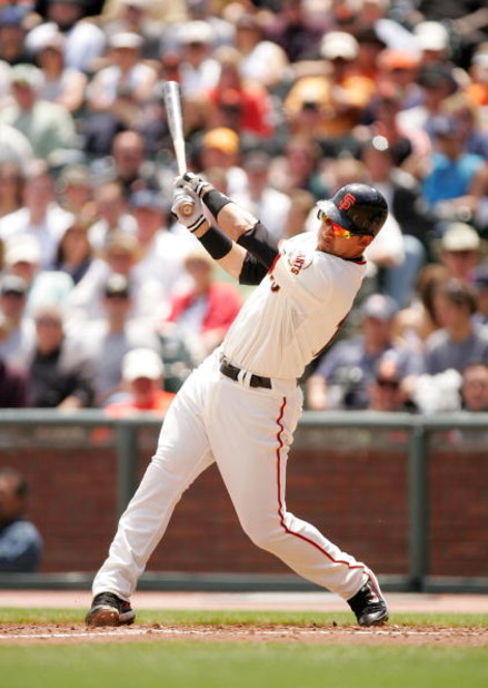SAN FRANCISCO - MAY 13:  Travis Ishikawa #10 of the San Francisco Giants bats against the Washington Nationals at AT&T Park on May 13, 2009 in San Francisco, California.  (Photo by Ezra Shaw/Getty Images)