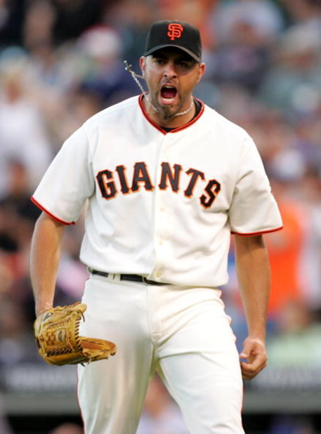 SAN FRANCISCO - MAY 17:  Pitcher Jeremy Affeldt #41of the San Francisco Giants celebrates after the Mets hit in to a double play with the bases loaded to end the eighth inning of their game against the New York Mets at AT&T Park on May 17, 2009 in San Fra