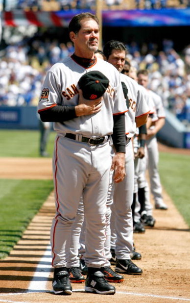 LOS ANGELES, CA - MARCH 31:  Manager Bruce Bochy #15 of the San Francisco Giants stands for the Natinal Anthem before  the Los Angeles Dodgers  Opening Day game at Dodger Stadium on March 31, 2008 in Los Angeles, California.  (Photo by Jeff Gross/Getty Im