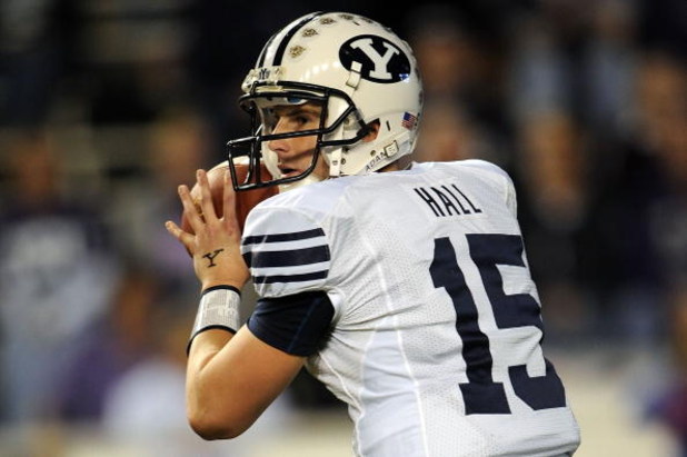 FORT WORTH, TX - OCTOBER 16:  Quarterback Max Hall #15 of the BYU Cougars drops back to pass against the TCU Horned Frogs in the first quarter at Amon G. Carter Stadium on October 16, 2008 in Fort Worth, Texas.  (Photo by Ronald Martinez/Getty Images)