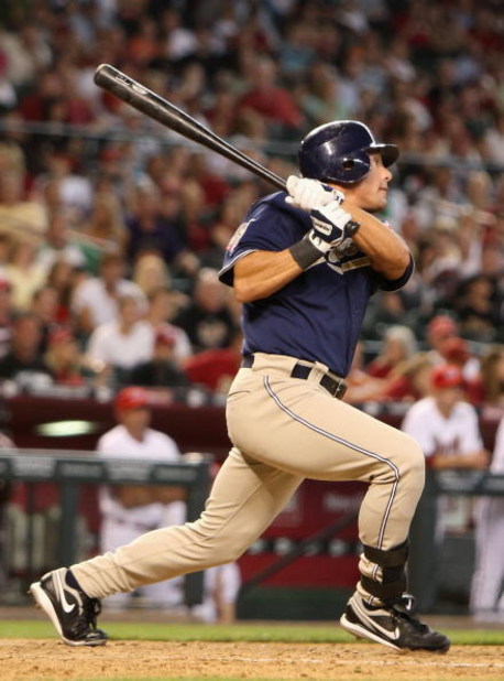 PHOENIX - MAY 25:  Brian Giles #24 of the San Diego Padres hits a double against the Arizona Diamondbacks during the ninth inning of the major league baseball game at Chase Field on May 25, 2009 in Phoenix, Arizona.  (Photo by Christian Petersen/Getty Ima