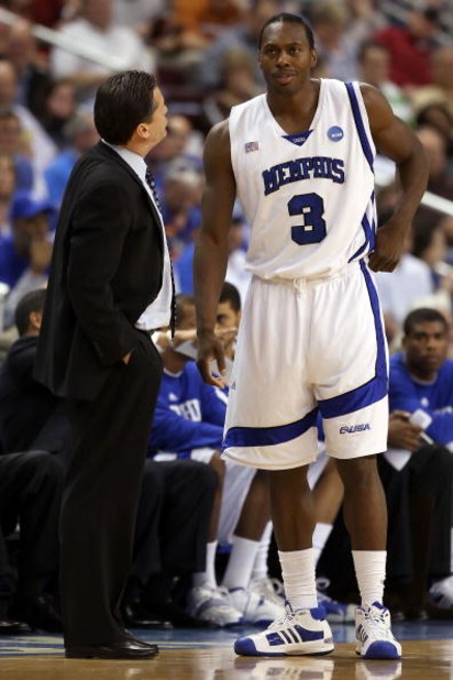 NORTH LITTLE ROCK, AR - MARCH 23:  Head coach John Calipari of the Memphis Tigers talks with his player Joey Dorsey #3 in the first half against the Mississippi State Bulldogs during the second round of the South Regional as part of the 2008 NCAA Men's Ba