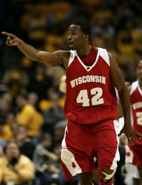 MILWAUKEE - DECEMBER 09:  Alando Tucker #42 of the Wisconsin Badgers celebrates in the final minute of Wisconsin's 70-66 win against the Marquette Golden Eagles December 9, 2006 at the Bradley Center in Milwaukee, Wisconsin.  (Photo by Jonathan Daniel/Get