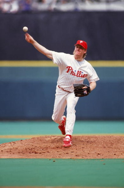 PHILADELPHIA - MAY 24:  Pitcher Curt Schilling #38 of the Philadelphia Phillies delivers a pitch during an MLB game on May 24, 1992 against the Cincinnati Reds at Veterans Stadium in Philadelphia, Pennsylvania. (Photo by Jeff Hixon/Getty Images)