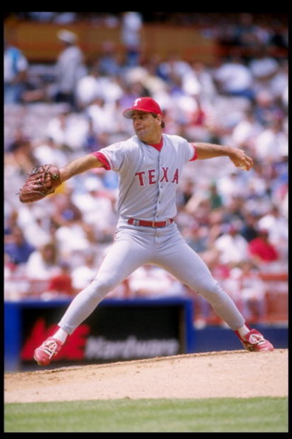 11 May 1995:  Pitcher Kenny Rogers of the Texas Rangers prepares to throw the ball during a game against the California Angels at Anaheim Stadium in Anaheim, California.  The Rangers won the game 6-2. Mandatory Credit: Stephen Dunn  /Allsport