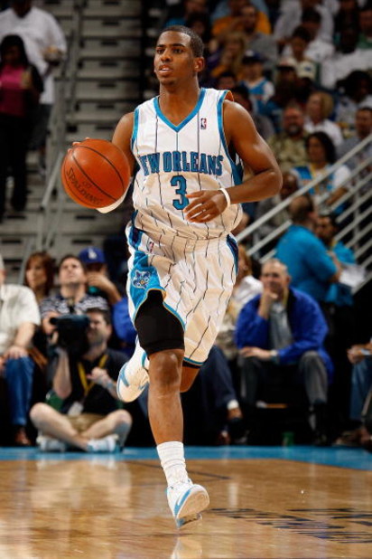 NEW ORLEANS - DECEMBER 26:  Chris Paul #3 of the New Orleans Hornets drives the ball up the court against the Houston Rockets on December 26, 2008 at the New Orleans Arena in New Orleans, Louisiana.  NOTE TO USER: User expressly acknowledges and agrees th