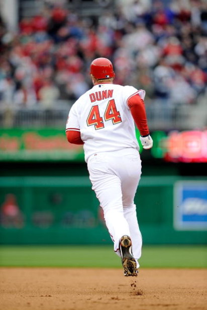 WASHINGTON - APRIL 13:  Adam Dunn #44 of the Washington Nationals rounds the bases after hitting home run in the seventh inning against the Philadelphia Phillies at Nationals Park on April 13, 2009 in Washington, DC.  (Photo by Greg Fiume/Getty Images)