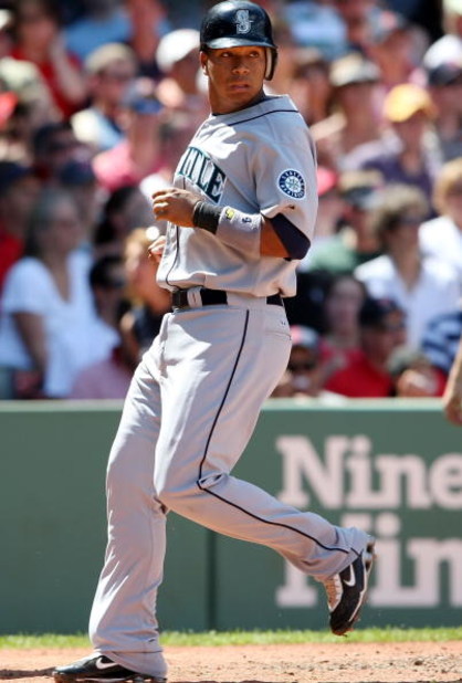 BOSTON - JULY 05:  Jose Lopez #4 of the Seattle Mariners scores a run in the fifth inning against the Boston Red Sox  on July 5, 2009 at Fenway Park in Boston, Massachusetts.  (Photo by Elsa/Getty Images)