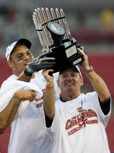 TAMPA, FL - DECEMBER 06:  Defensive end Orion Martin #90 and head coach Frank Beamer of the Virginia Tech Hokies holds up the ACC trophy after defeating the Boston College Eagles in the 2008 ACC Football Championship game at the Raymond James Stadium on D